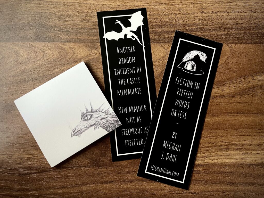 Post it notes featuring a dragon illustration and two bookmarks.